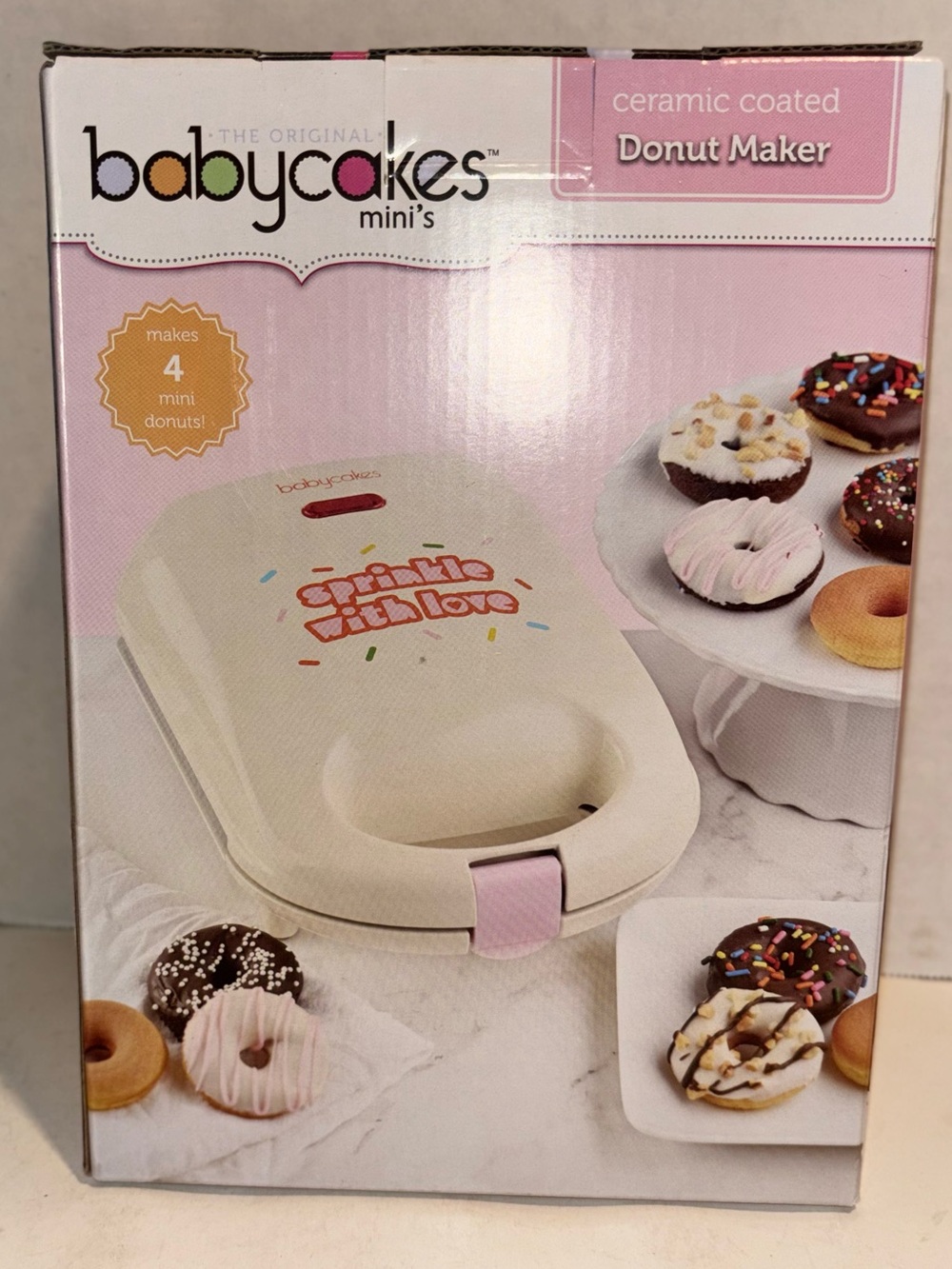 babycakes Ceramic Coated Mini Donut Maker in Cream and Pink-new in box